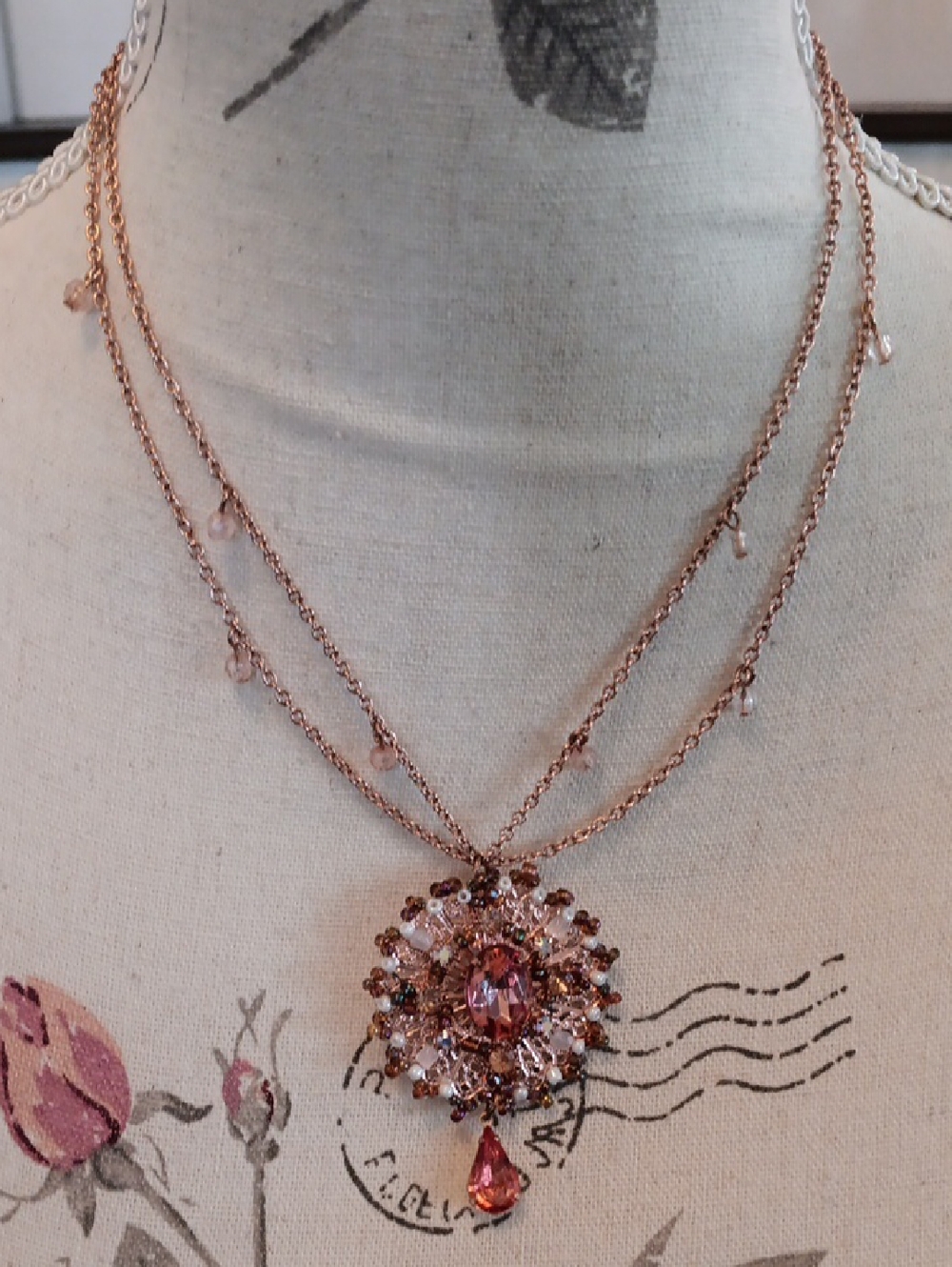 # Avon Rose Gold Tone Crystal Pendant Double Strand Necklace